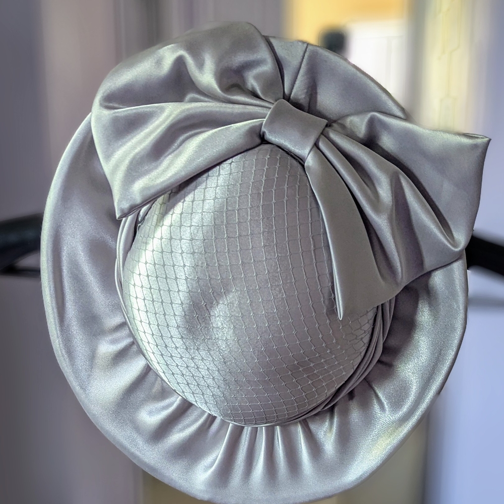 Elegant Silver Bow Hat Perfect For The Racetrack Or The Chapel